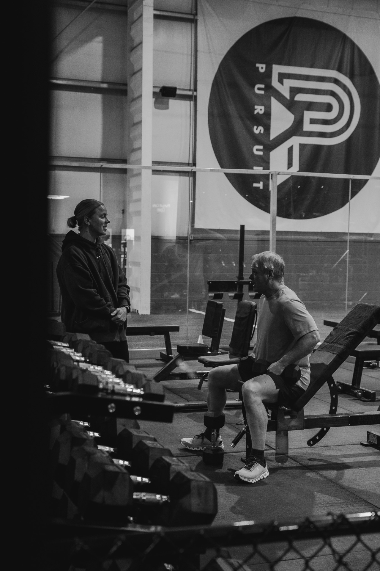 Coach checking in with a member